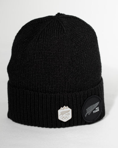 Black beanie with embroidered logos on a white background